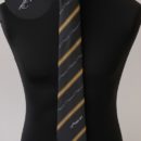 Cravate personnalisée (noires, rayures or,logo gris) , personnel compagnie aérienne